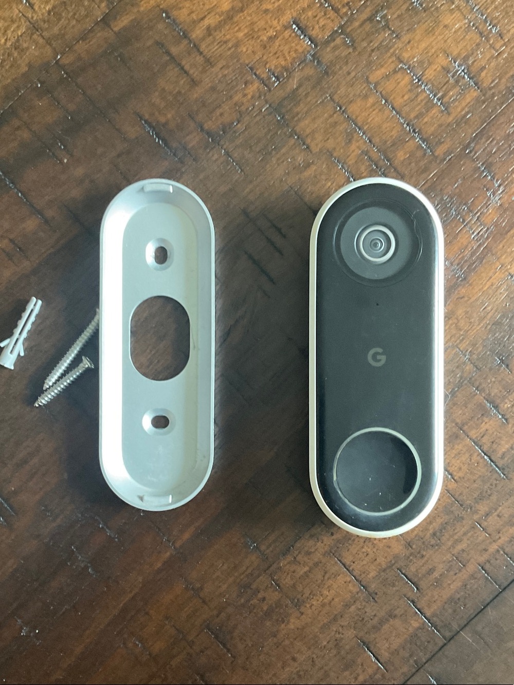 Google Nest Doorbell in black with white trim - compact wired webcam
